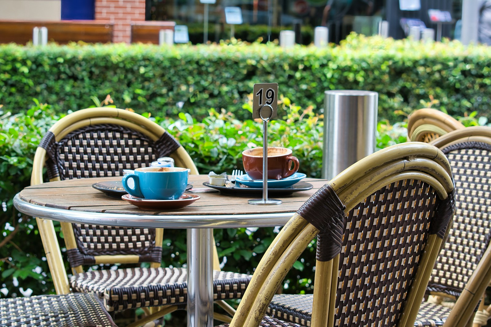 An outdoor European cafe table in afternoon light